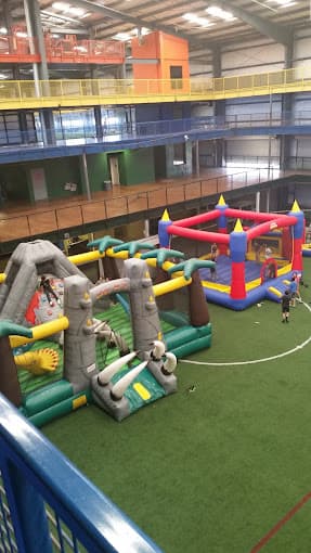 Bounce houses on lower soccer field